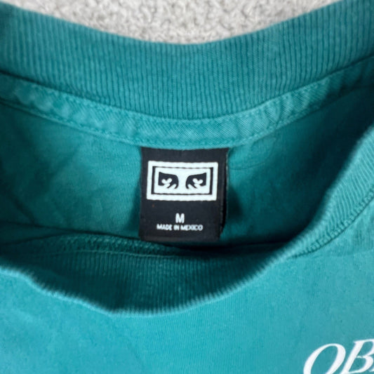 Obey Studios Mens Medium Graphic T-Shirt Teal Green Short Sleeve Crewneck